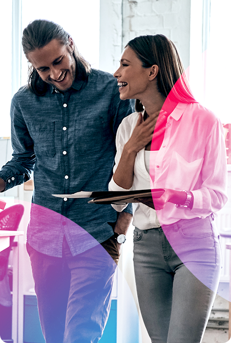 Photo of a man and a woman discussing skills and roles